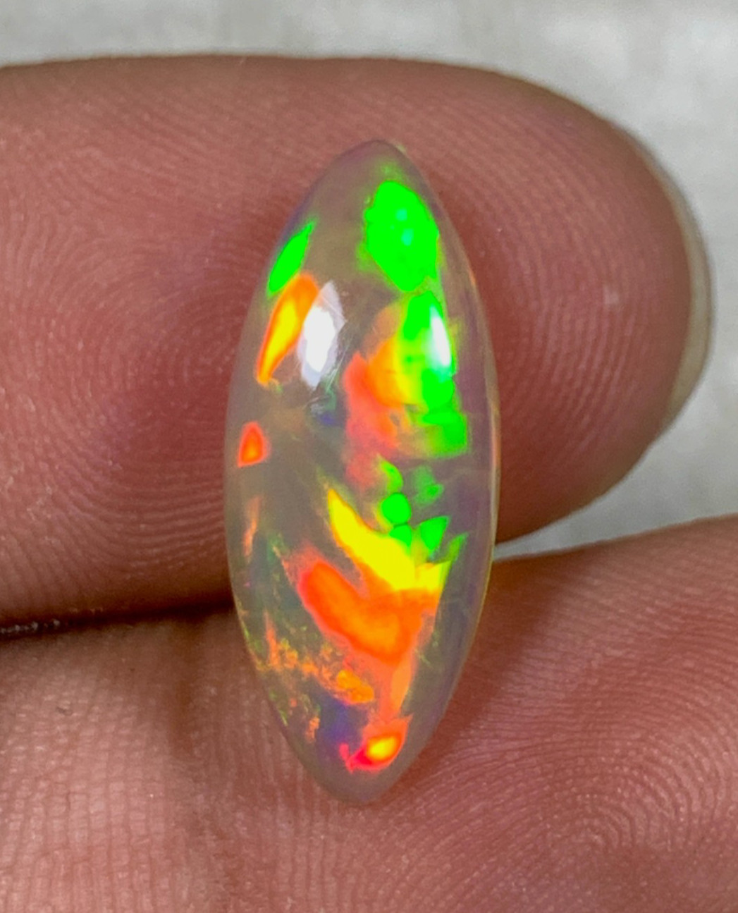 Natural Dark Base Ethiopian Opal 2.85crt Rainbow Fire Marquise Cabochon Gemstone