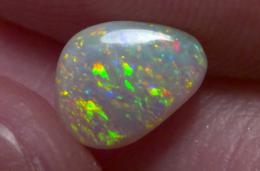 0.87cts Solid Lightning ridge opal, stunning rainbow fire & pattern *see video*