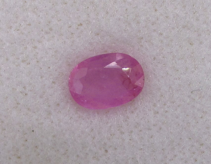 1.34 Carat Medium Pink Sapphire, 8.5 x 4 mm Oval, Very Slightly Included.