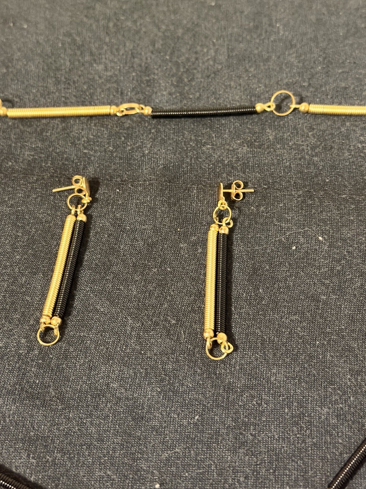 Abstract Gold‑Tone Black Coil Necklace & Earrings Set Modern Industrial Design