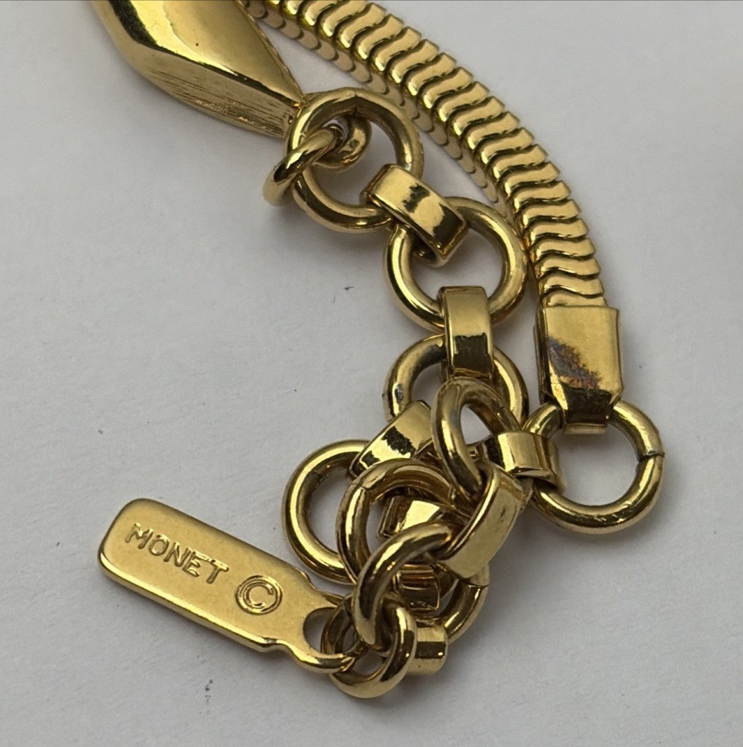 VINTAGE DESIGNER FASHION NECKLACE ~ LOVE KNOT LARIAT DROP DANGLE ~ MONET 16″