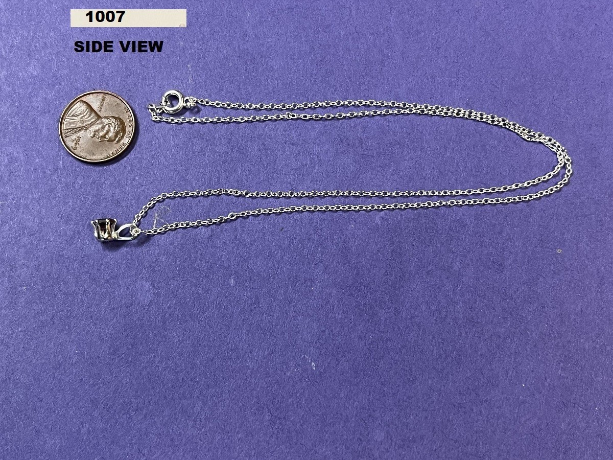 18″ SILVER TONE NECKLACE WITH A PURPLE STONE #1007