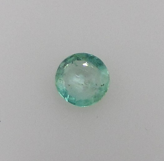 0.46 Carat Green Emerald, 5.6 mm Round, Very Slightly Included. COA