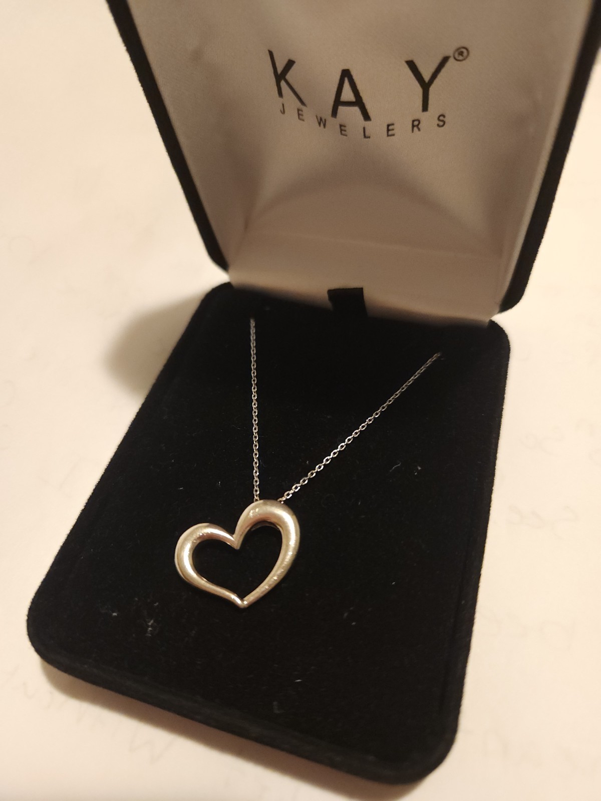 Sterling silver heart shaped necklace Kay Jewelers with case hangs 16 inch chain