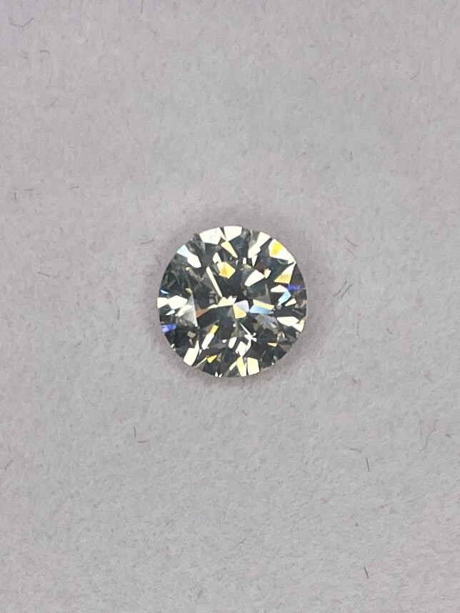 Certified 1.475 Carat Natural Diamond Clarity SI-2 Color K Cut Very Good Round