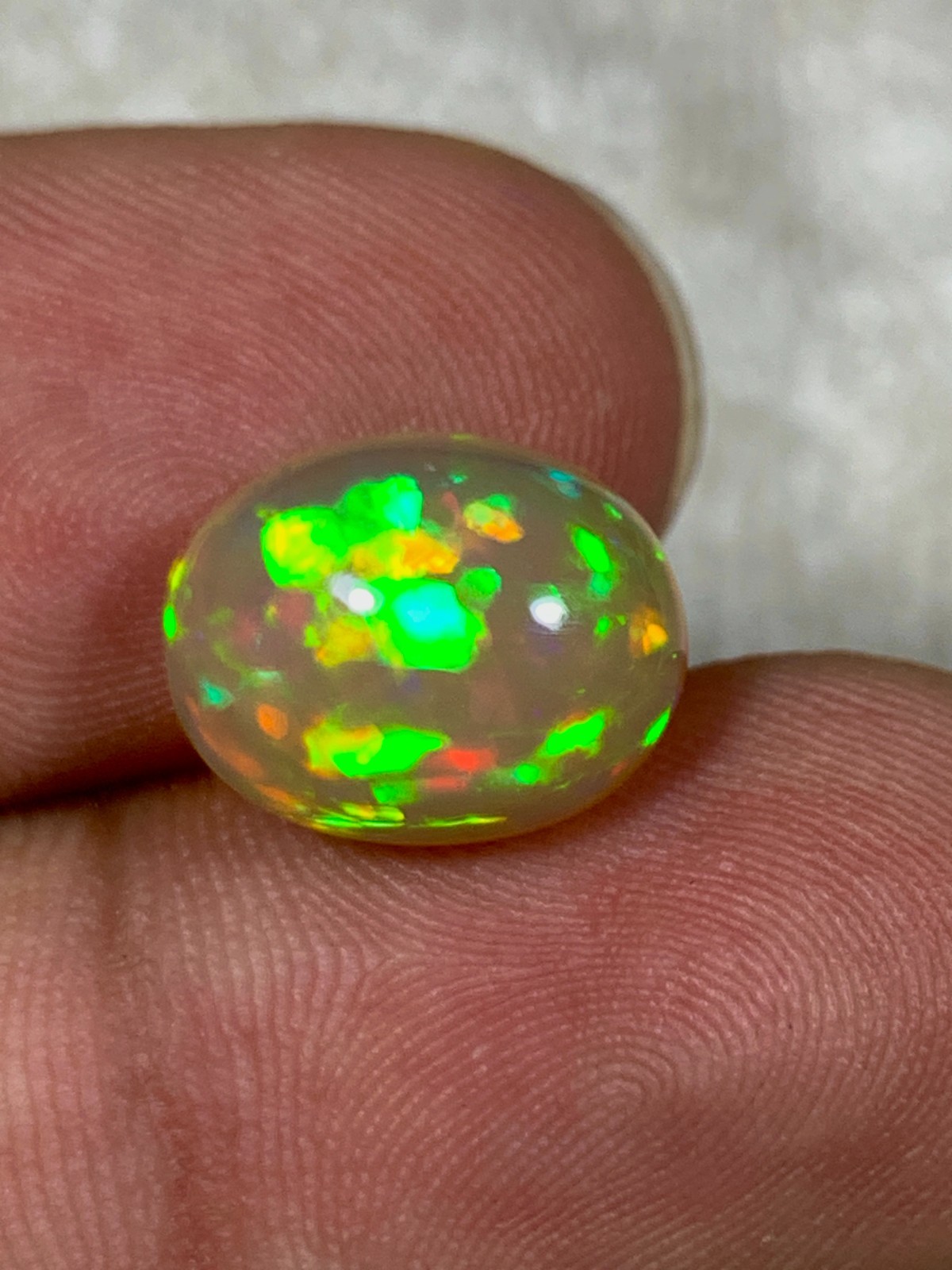Natural Orange Ethiopian Welo Opal Rare Harlequin Pattern 4 Carats Oval Cabochon