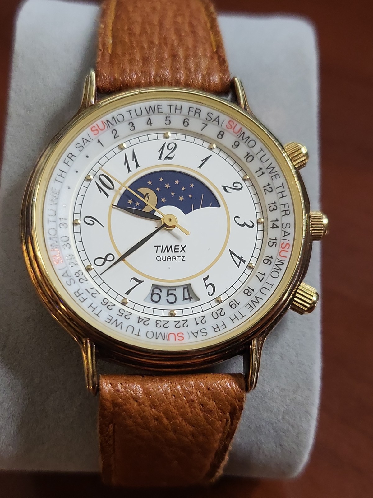 Vintage Timex 364 T Cell gold-tone Quartz Watch featuring a sun and moon phase