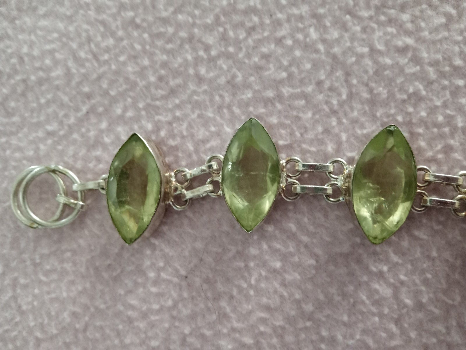 7 inch Bracelet with 5 faceted pale green stones set in silver