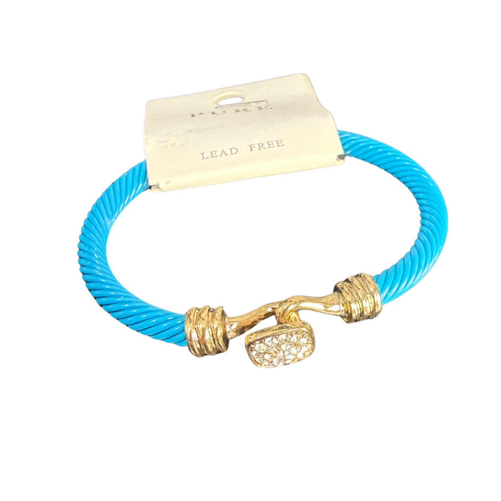 Blue cable cuff bracelet with gold accents and a crystal‑decorated end.