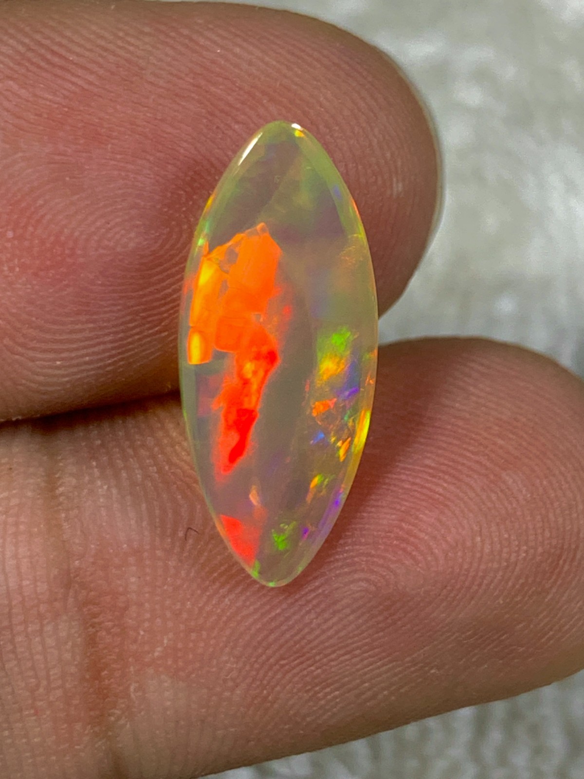 Natural Dark Base Ethiopian Opal 2.85crt Rainbow Fire Marquise Cabochon Gemstone