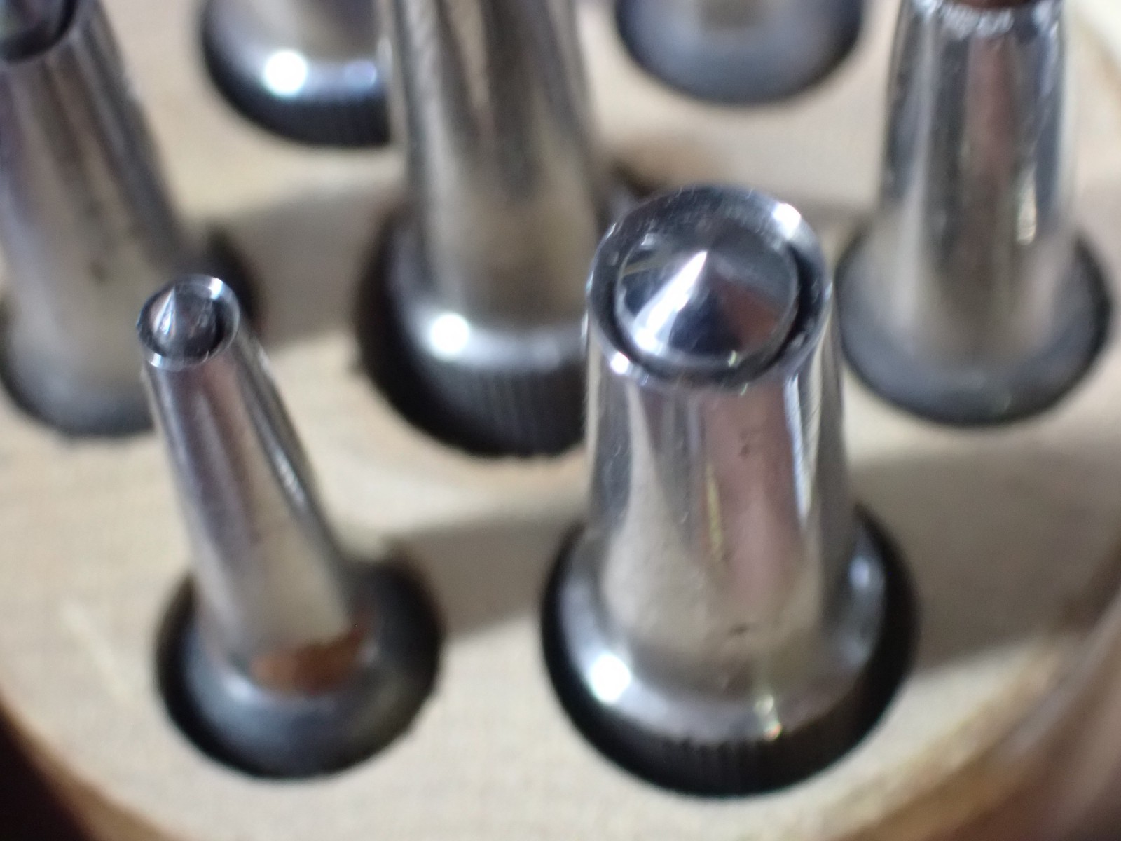 7 Unbranded Watchmakers Hole Closing Punches with Grooved Handles very good