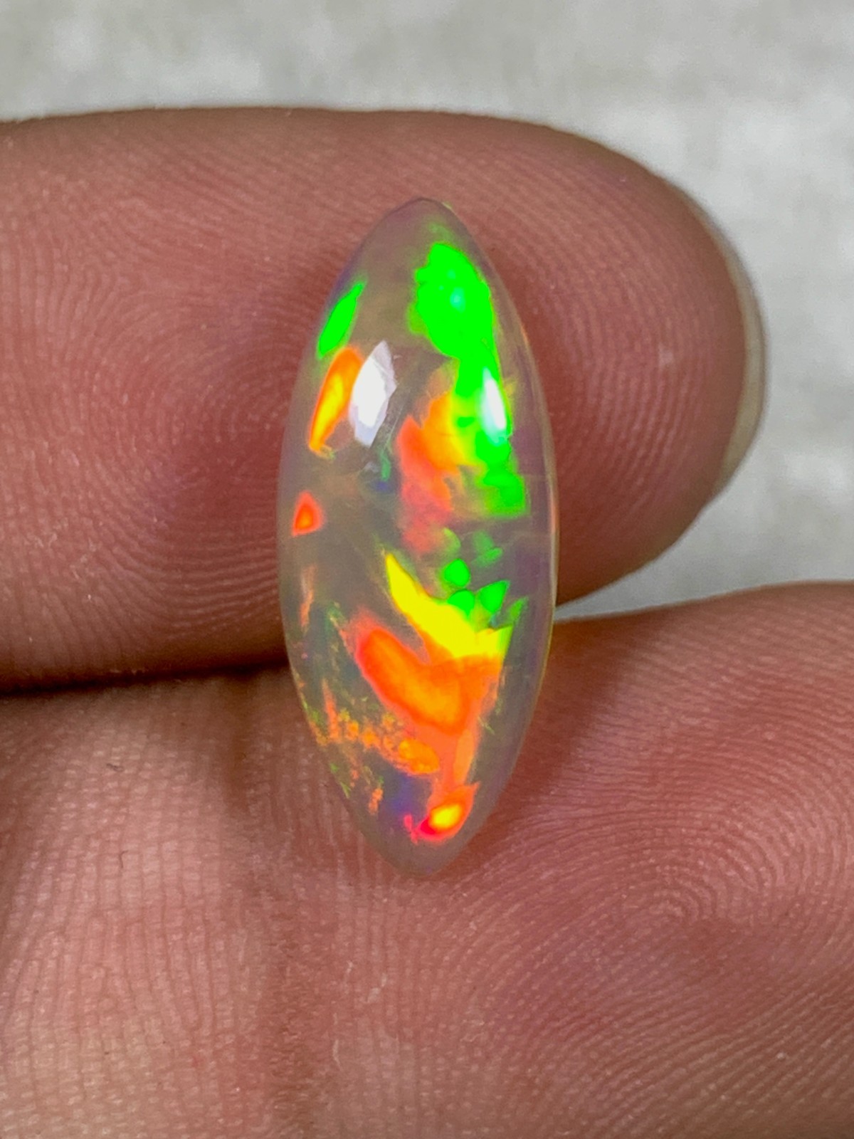 Natural Dark Base Ethiopian Opal 2.85crt Rainbow Fire Marquise Cabochon Gemstone