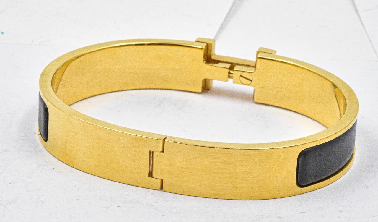 Guaranteed Authentic Hermes Clic H Black Enamel Gold Plated Bracelet F1 02 51