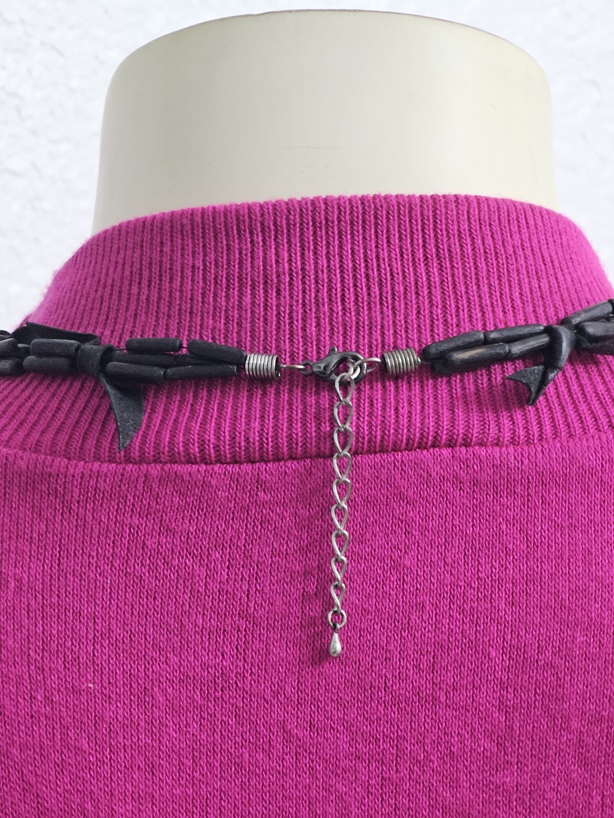 Rare long necklace wood and leather very light weight material. Monies maybe??