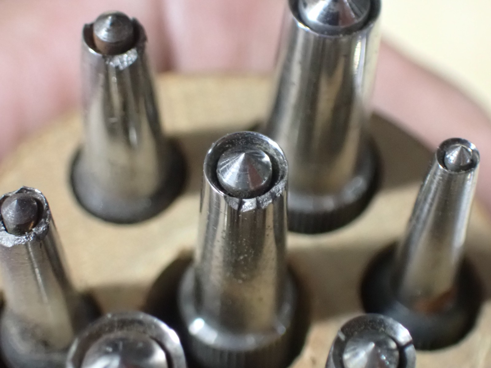 7 Unbranded Watchmakers Hole Closing Punches with Grooved Handles very good