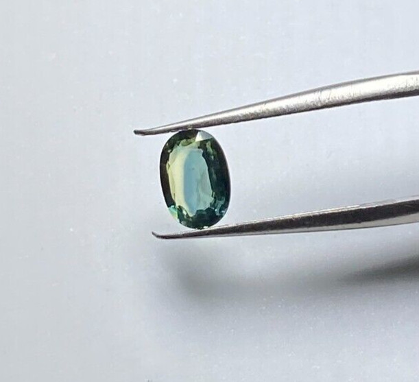 0.82 CTS HEATED MADAGASCAR BLUE/GREEN SAPPHIRE, OVAL CUT 6.5 X 5 X 2.8 MM VVS