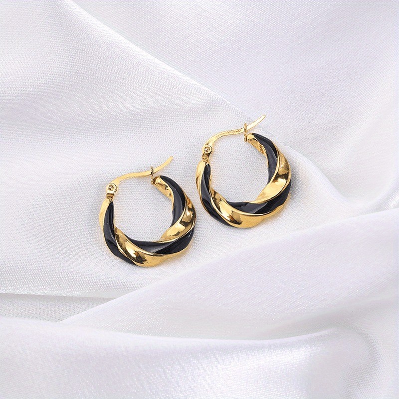 Bohemian Stainless Steel Drip Oil Earrings Women’s Irregular Twisted Ear Buckle