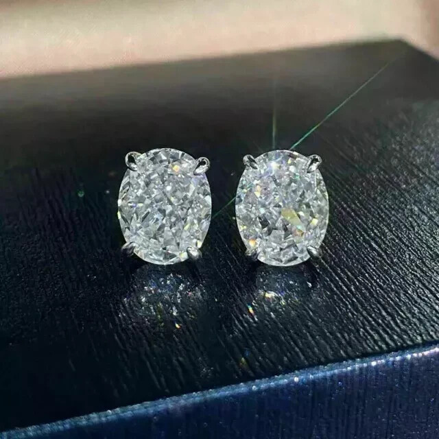 4Ct Oval Cut Lab Created Diamond Women’s Stud Earrings In 14K White Gold Plated
