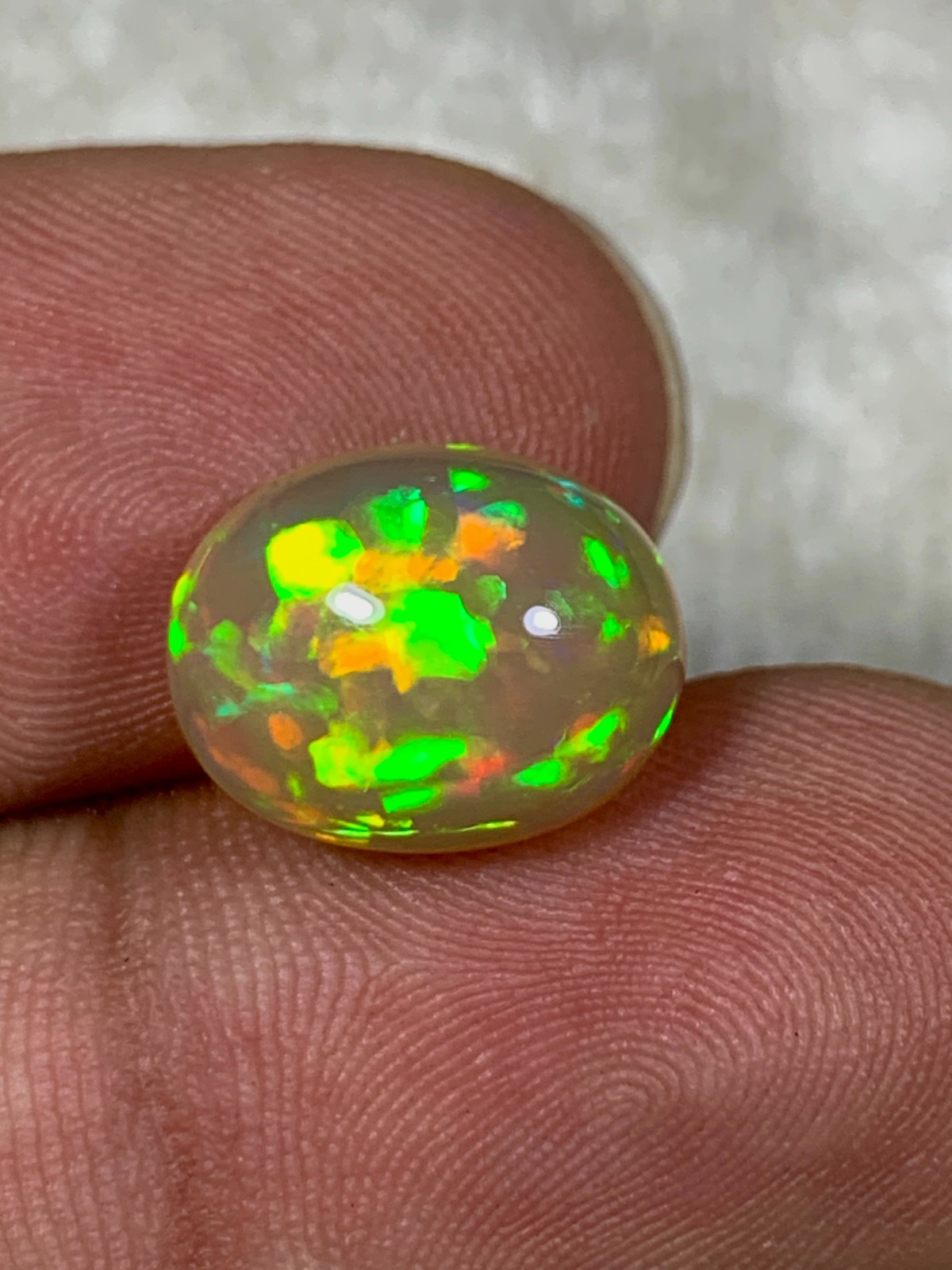 Natural Orange Ethiopian Welo Opal Rare Harlequin Pattern 4 Carats Oval Cabochon