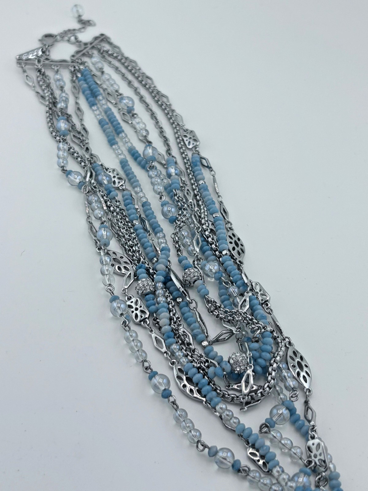 WHBM multi strand necklace. Pale Blue and icy-grey faceted seeds