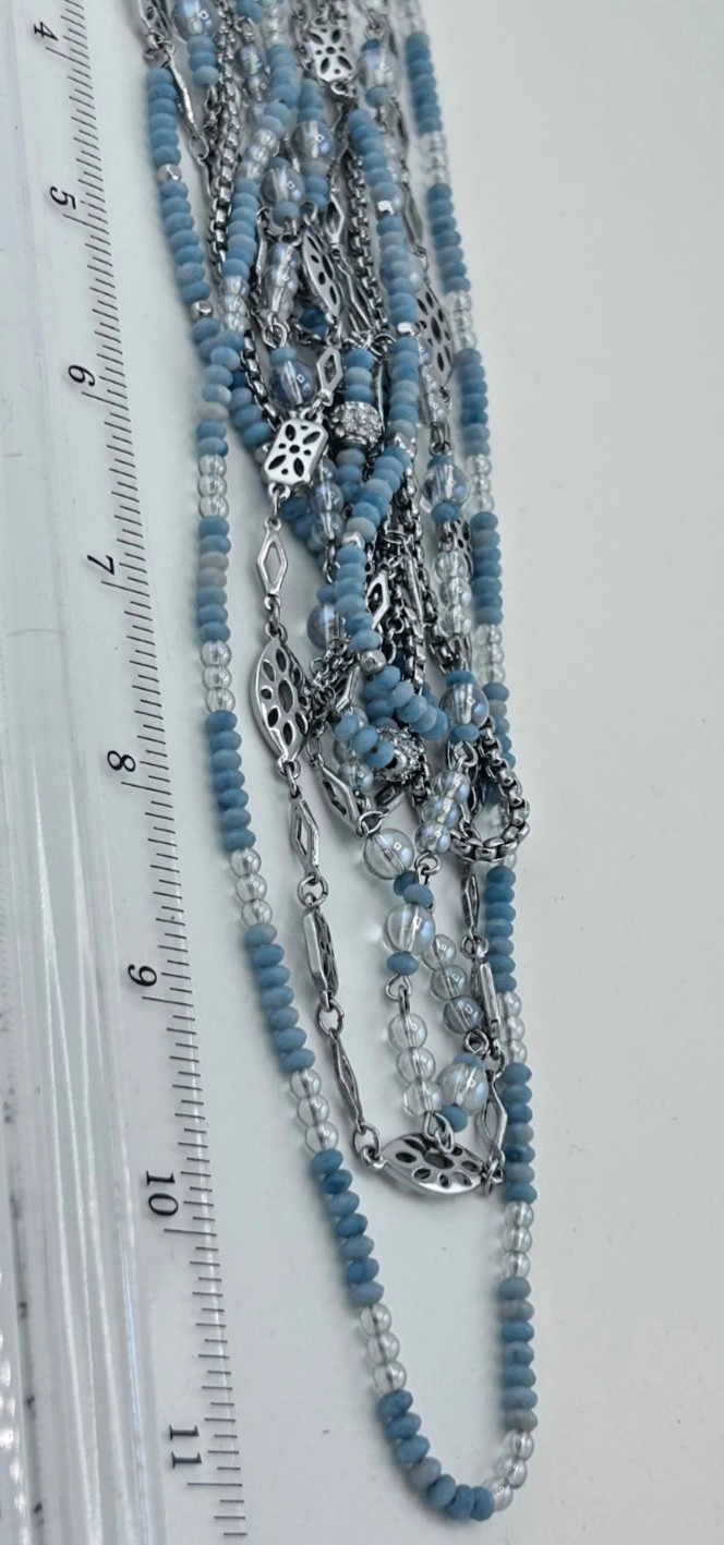WHBM multi strand necklace. Pale Blue and icy-grey faceted seeds