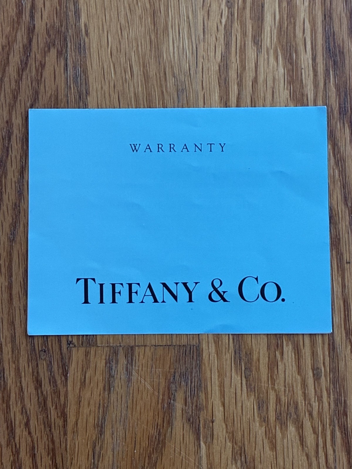 TIFFANY & CO FULL ONE YEAR WARRANTY CARD-OPEN