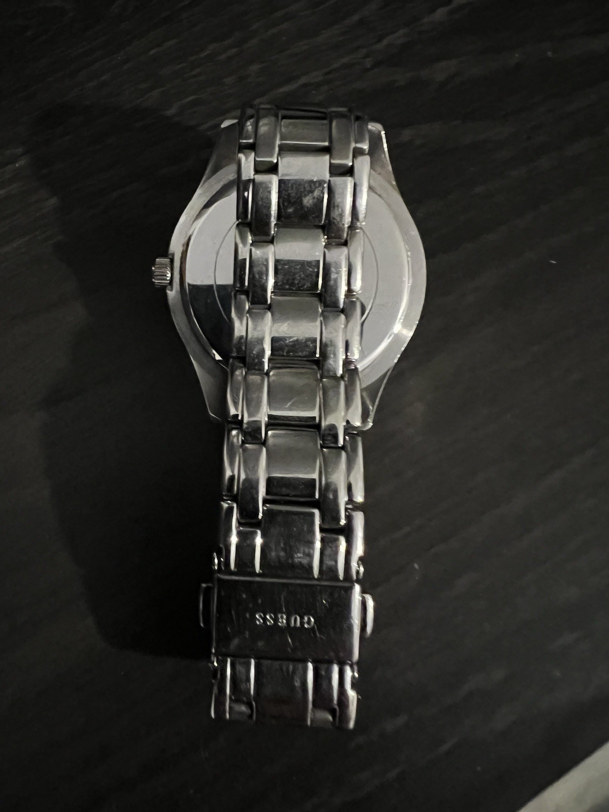 GUESS Women’s Silver Analog Roman Numeral Date Gem-Set Bezel Metal Bracelet