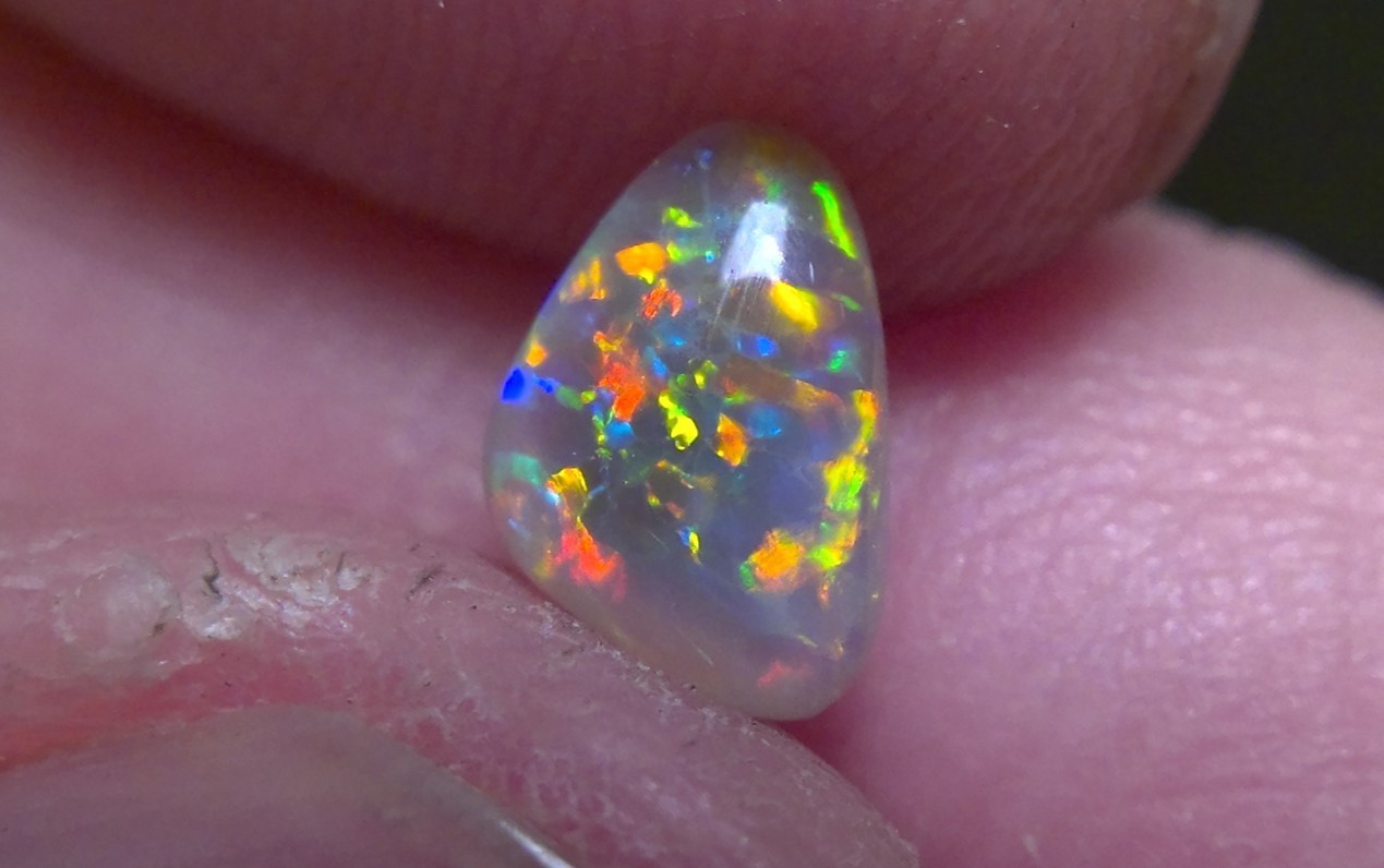 0.89cts Solid Lightning Ridge semi-black opal, extremely bright top gem + video