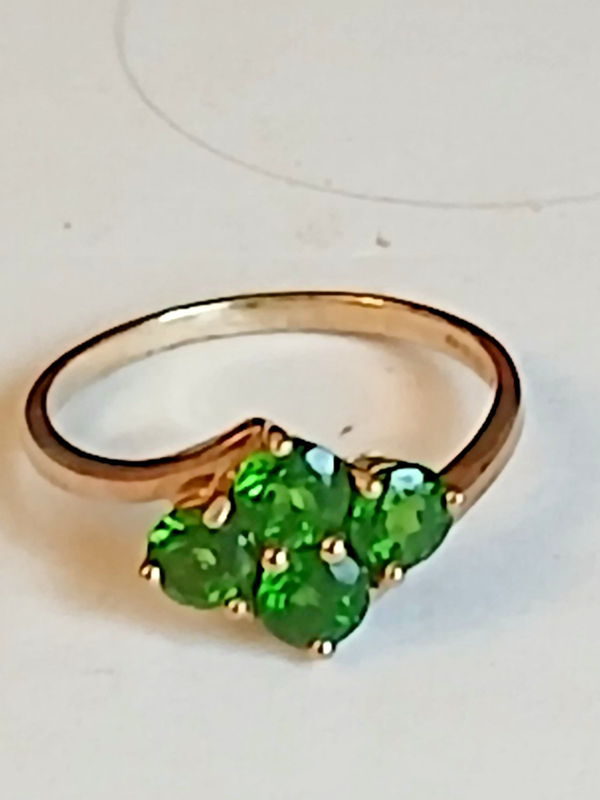 9 carat gold ring with 4 rare green garnets size u/v weight 2.75 grams