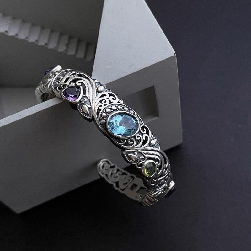 Openwork carved blue topaz bracelet for women, vintage style.