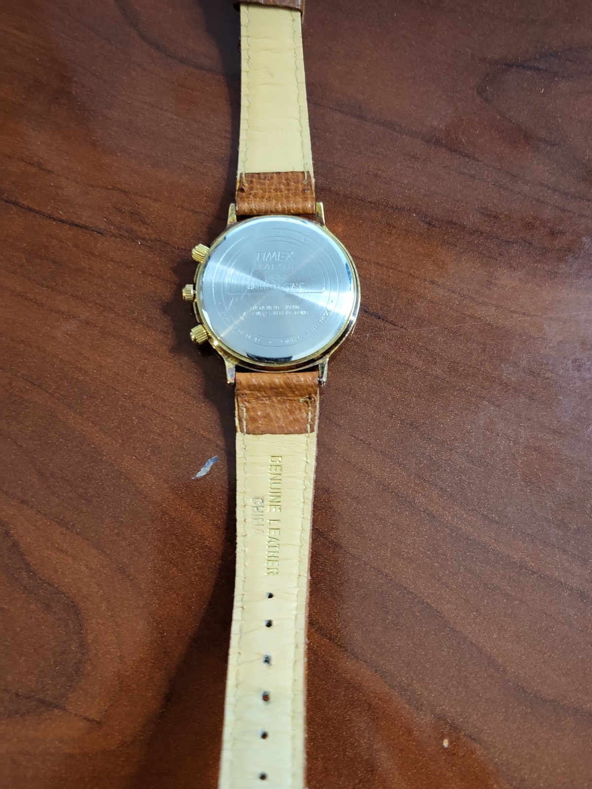 Vintage Timex 364 T Cell gold-tone Quartz Watch featuring a sun and moon phase