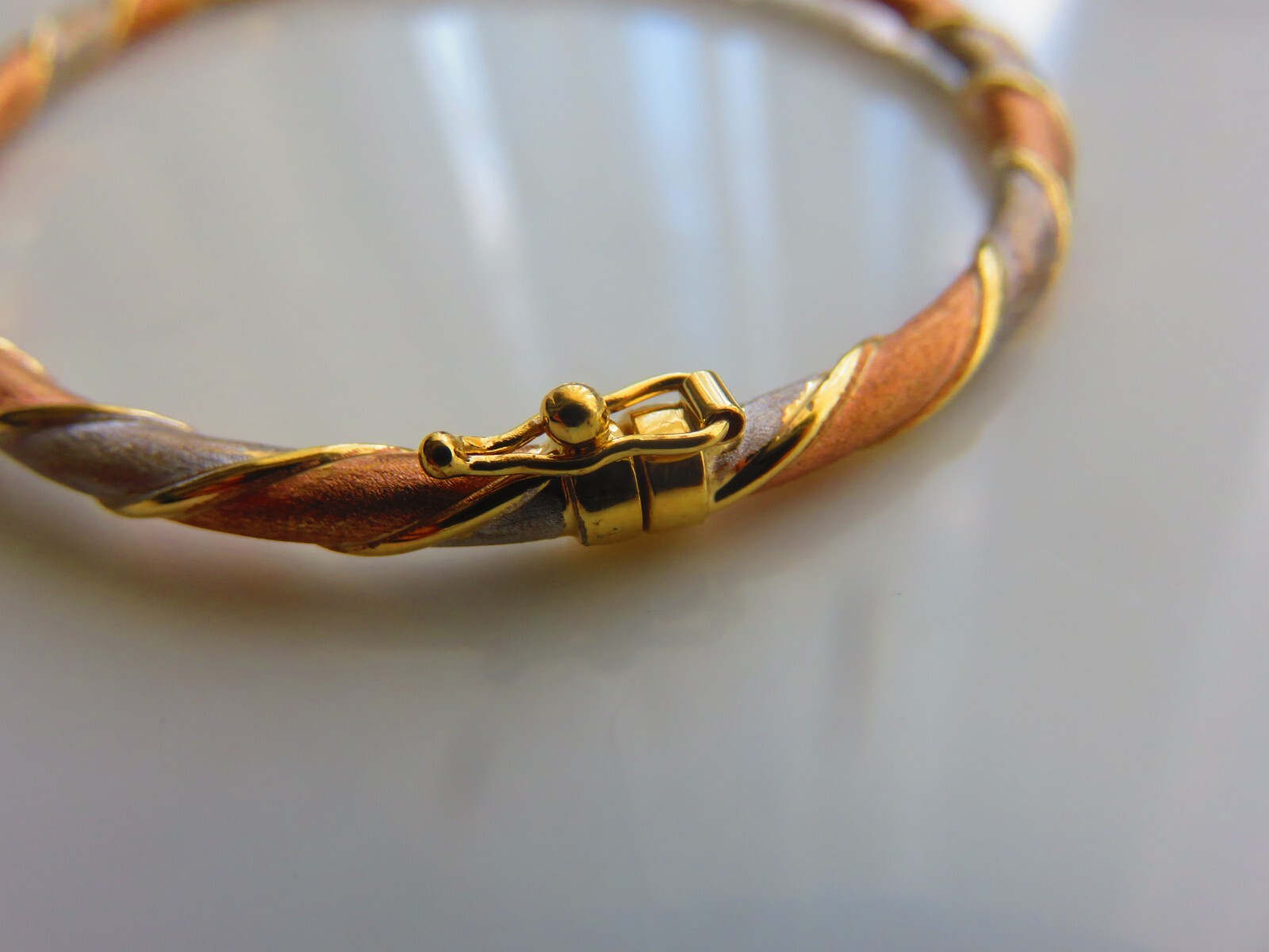 Gold Hinged Bangle 9 Carat Multi Coloured Gold Twisted Oval