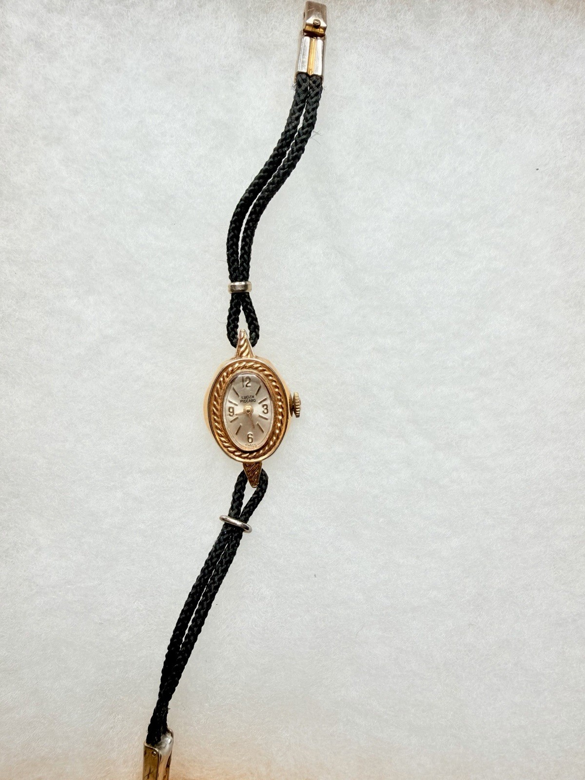 Lucien Piccard Swiss Made Vintage Oval Manual Wind Watch Gold Case Black Strap
