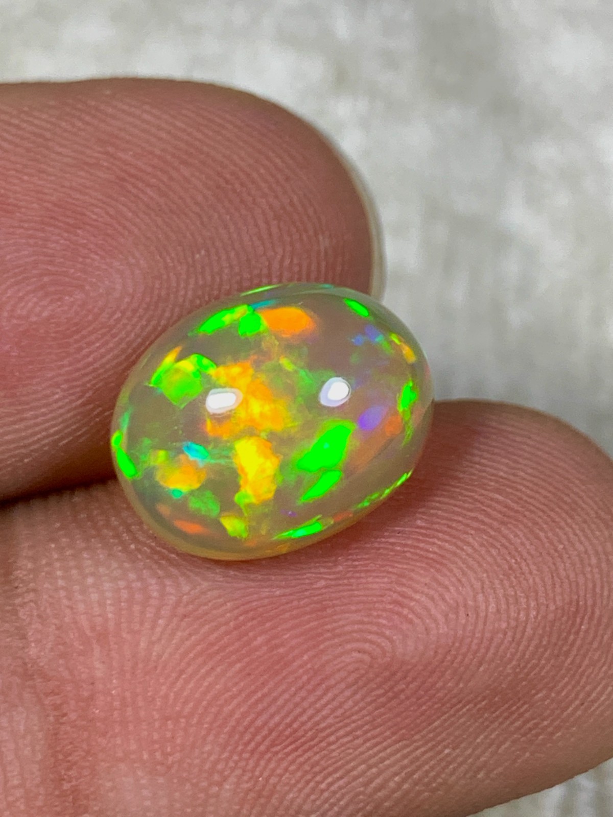Natural Orange Ethiopian Welo Opal Rare Harlequin Pattern 4 Carats Oval Cabochon