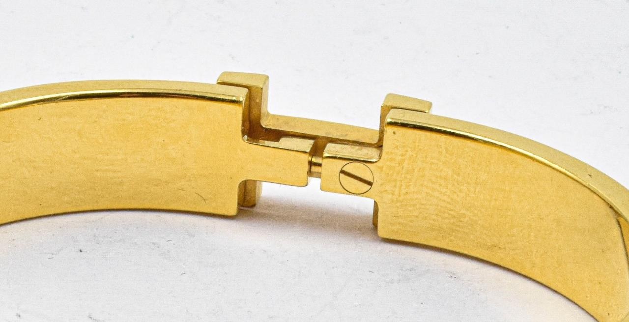 Guaranteed Authentic Hermes Clic H Black Enamel Gold Plated Bracelet F1 02 51