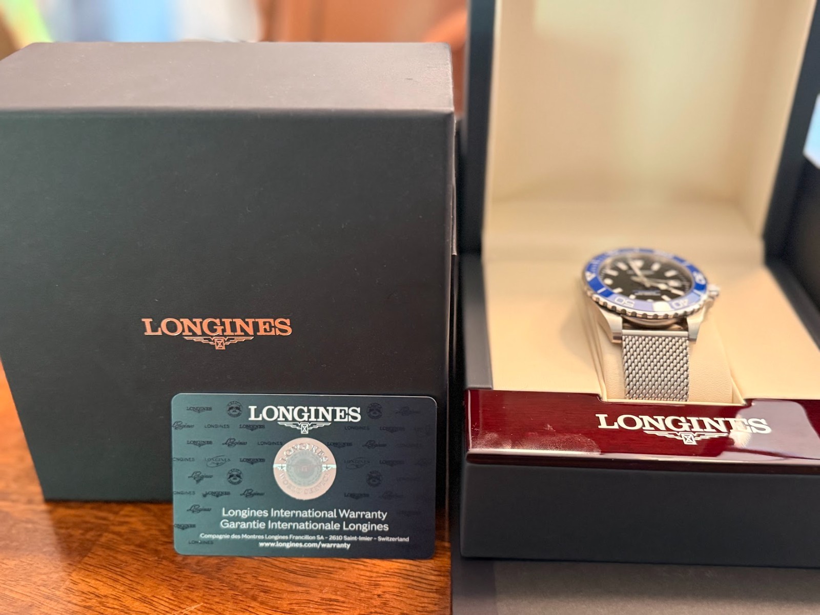 Longines HydroConquest 42mm Black Dial Blue Ceramic Bezel Mesh L3.788.4.90.6