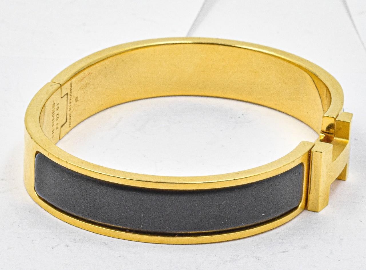 Guaranteed Authentic Hermes Clic H Black Enamel Gold Plated Bracelet F1 02 51