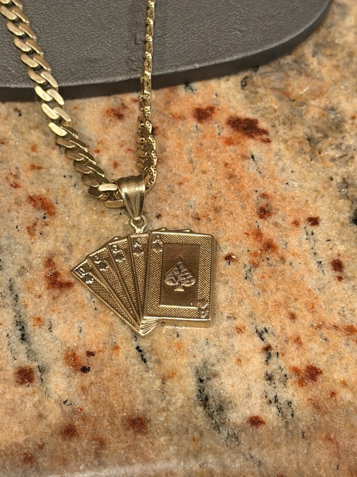 14kt 22″ Cuban 5mm 10.66 grams With 10k Cards Pendant