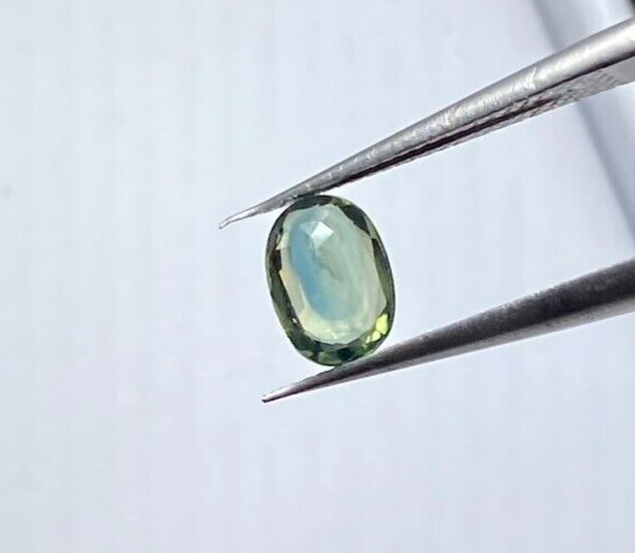 0.82 CTS HEATED MADAGASCAR BLUE/GREEN SAPPHIRE, OVAL CUT 6.5 X 5 X 2.8 MM VVS