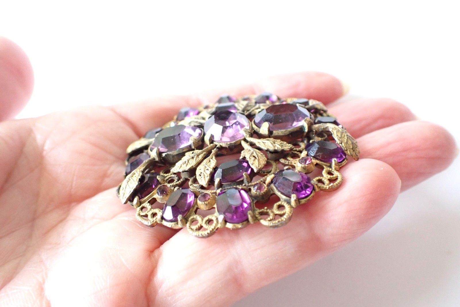 Vintage Czech Gold Tone Filigree Brooch W/ Purple Open Back Rhinestones Paste