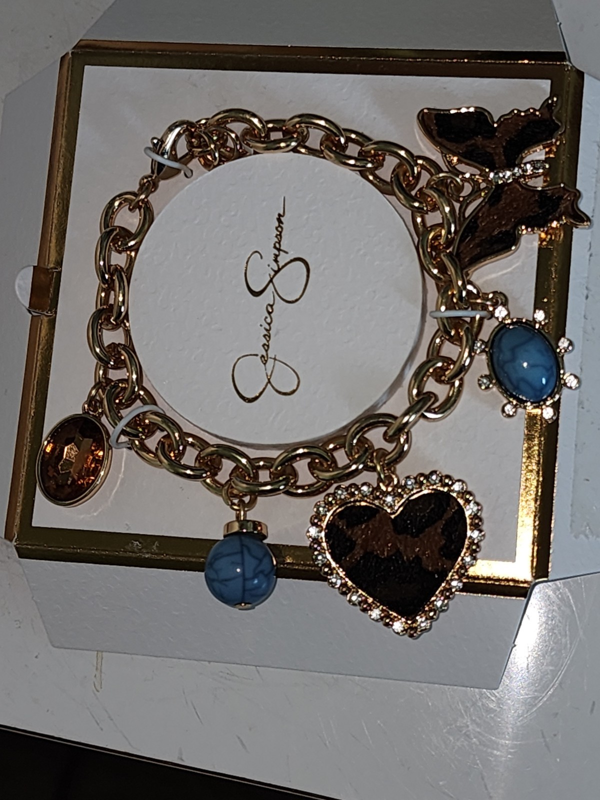 Jessica Simpson Gold Tone Charm Bracelet Blue Crystals Heart Butterfly