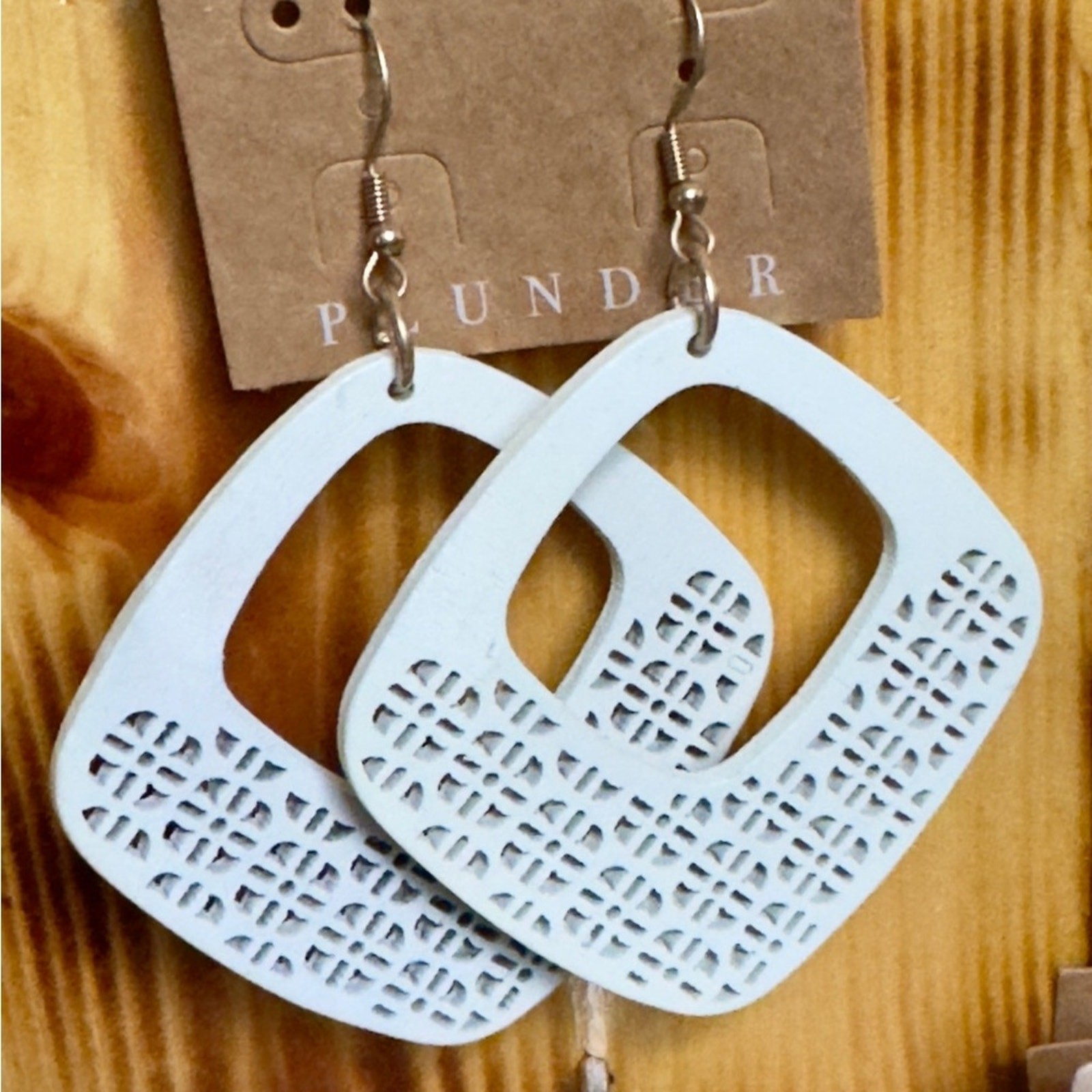 Plunder White Geometric Earrings with Intricate Cutouts
