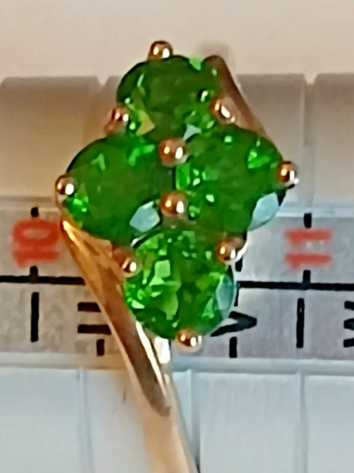 9 carat gold ring with 4 rare green garnets size u/v weight 2.75 grams