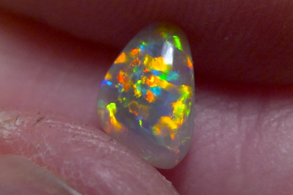 0.89cts Solid Lightning Ridge semi-black opal, extremely bright top gem + video