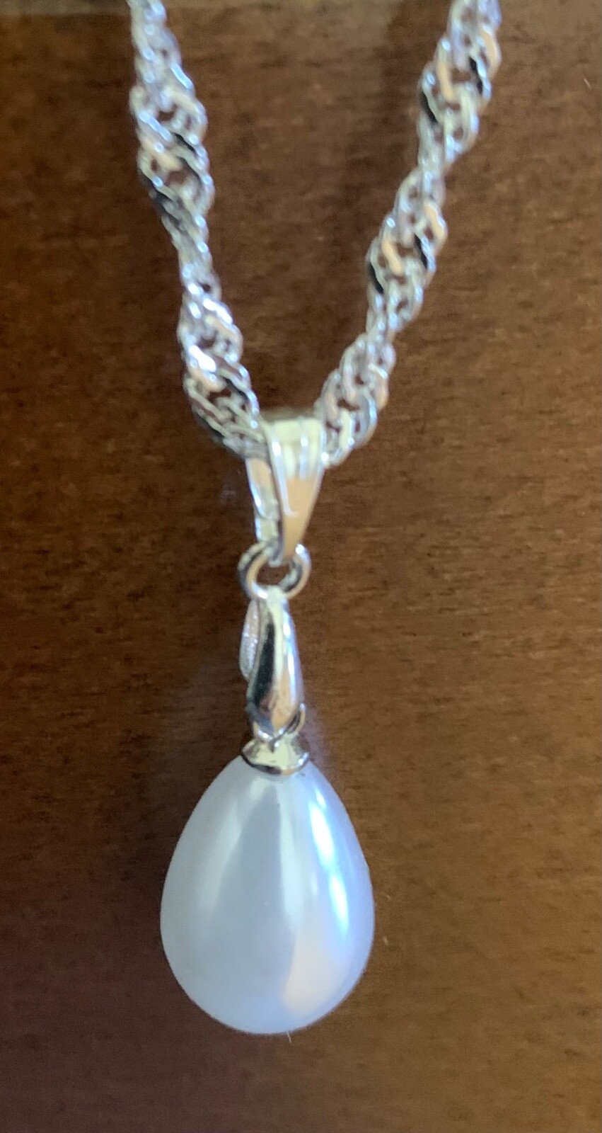18″ Stainless Steel Chain with a White Glass Teardrop Pearl Pendant