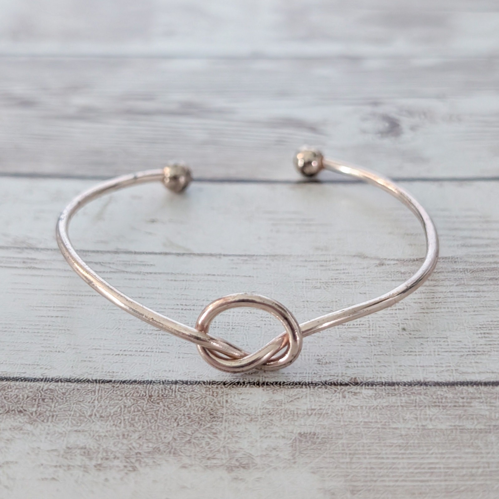 Very Light Shade of Rose Gold Tone Knot Bracelet – Condition Issues