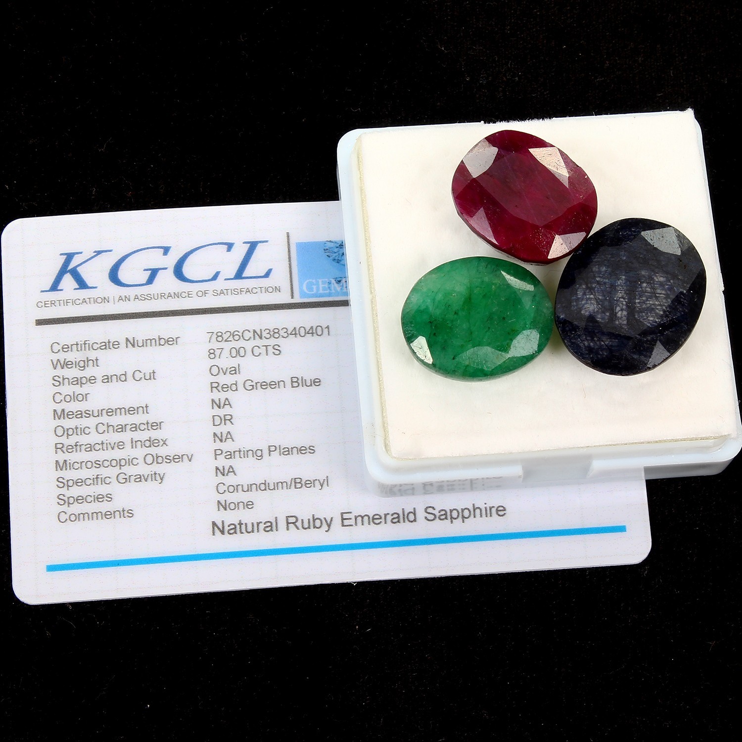 Certified Lot 18-22mm Natural Ruby, Sapphire & Emerald Oval Cut Gemstones 87 Cts