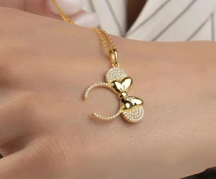 Sterling Silver Gold Finished -Tone Bow Pendant Necklace with Crystal Accents