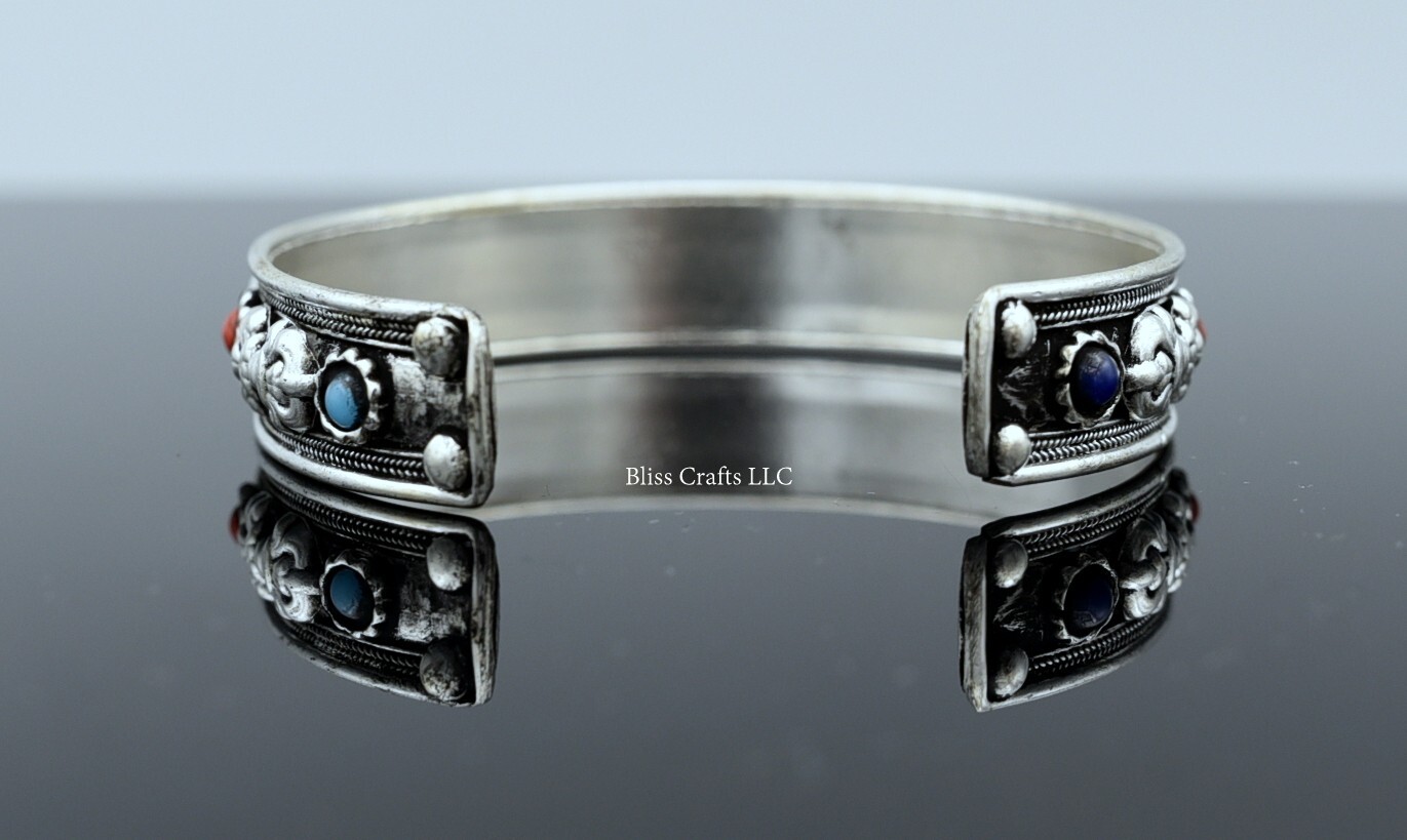 Om Mani Padme Hum with Dorjee combination with turquoise and coral Bracelet