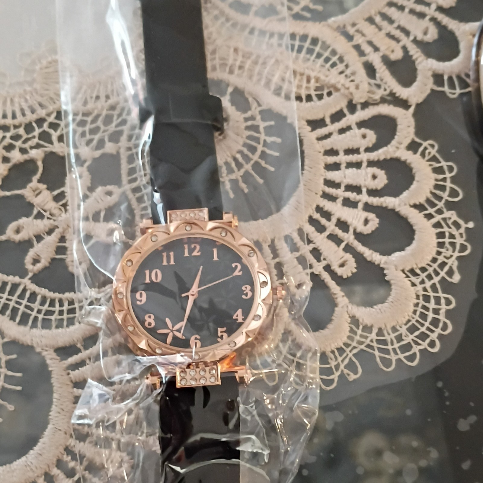 Women’s Rose Gold Tone Round Analog Wristwatch Black Band Floral Dial Arabic